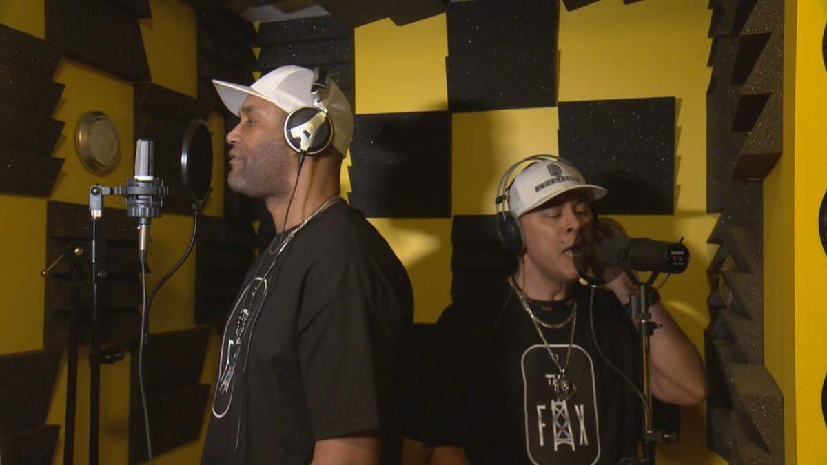 Jason Crawford (left), half of the musical duo Tha Fax, hopes his life story inspires others to believe they can overcome obstacles.