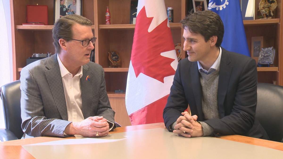 Mayor Michael Fougere and Prime Minister Justin Trudeau meet in Regina in March, 2018.