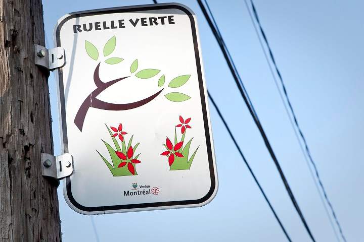 A Ruelle verte sign is pictured in Montreal Friday October 26, 2012. Ruelle verte (Green back alley) is the renaturalization of Montreal back alleys to improve the quality of live of citizens. 