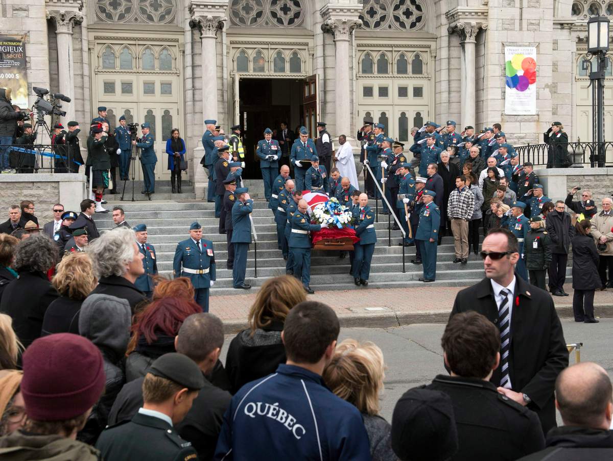 The casket of warrant officer Patrice Vincent leaves the church after funeral services November 1, 2014 in Longueuil, Quebec. On social media, Othman Hamdan allegedly called Vincent’s killer a “hero.” THE CANADIAN PRESS/Ryan Remiorz