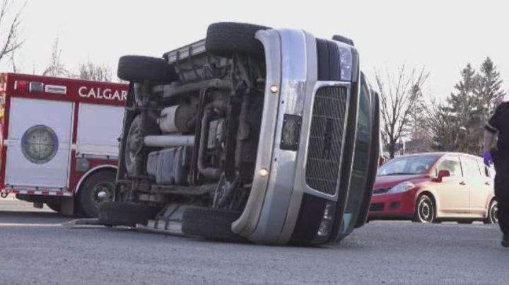 Crews on scene at a rollover on 16 Avenue N.W. Friday.