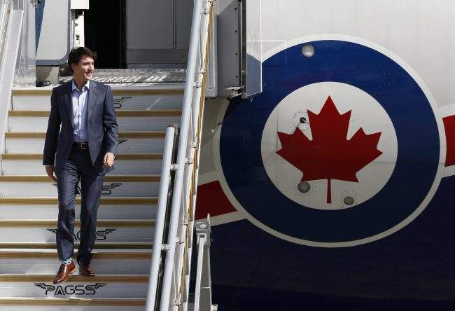 Prime Minister Justin Trudeau descends a plane's angway as he arrives at the Clark International Airport in Pampanga province, north of Manila, Philippines 12 November 2017. 

