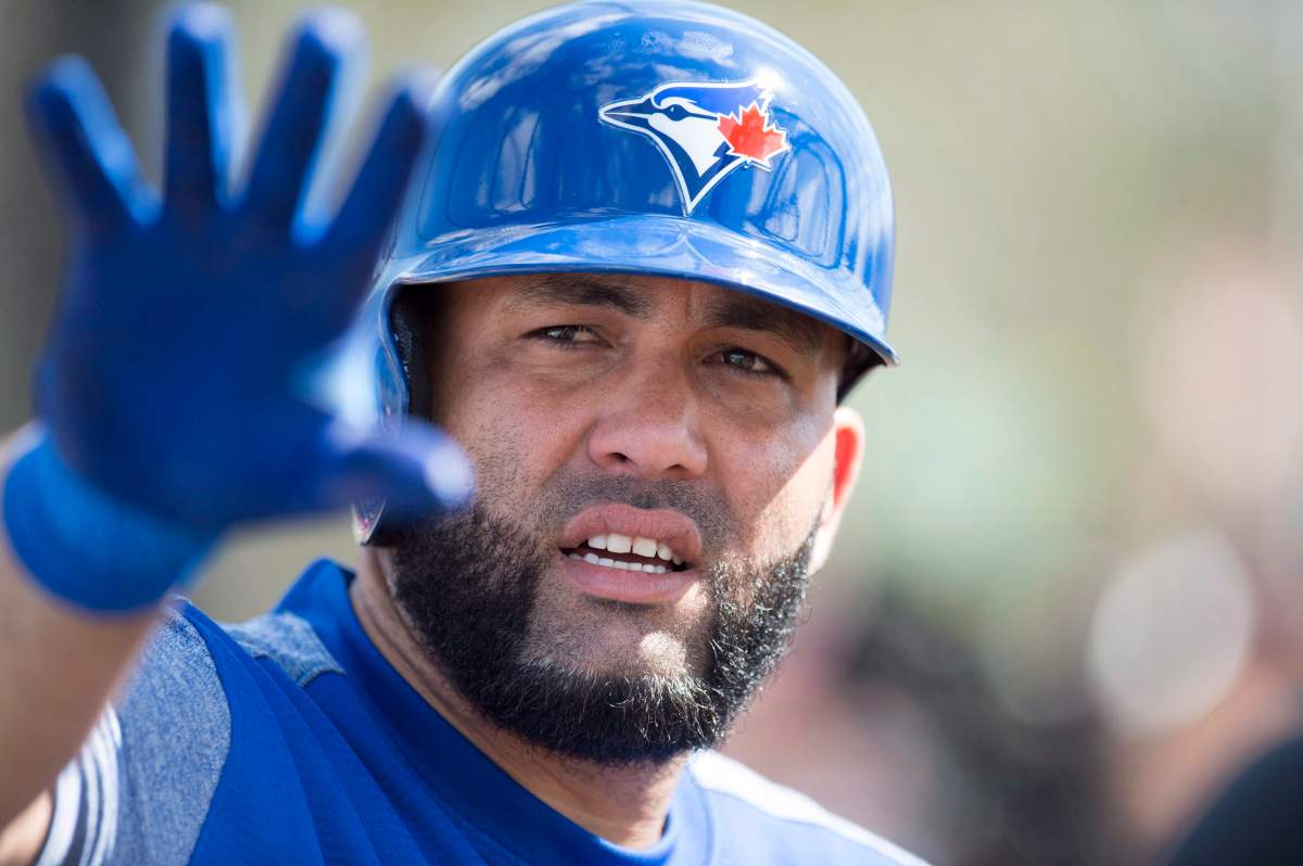 Toronto Blue Jays Kendrys Morales talks by the batting cage at spring training in Dunedin, Fla. on Tuesday, February 20, 2018. 