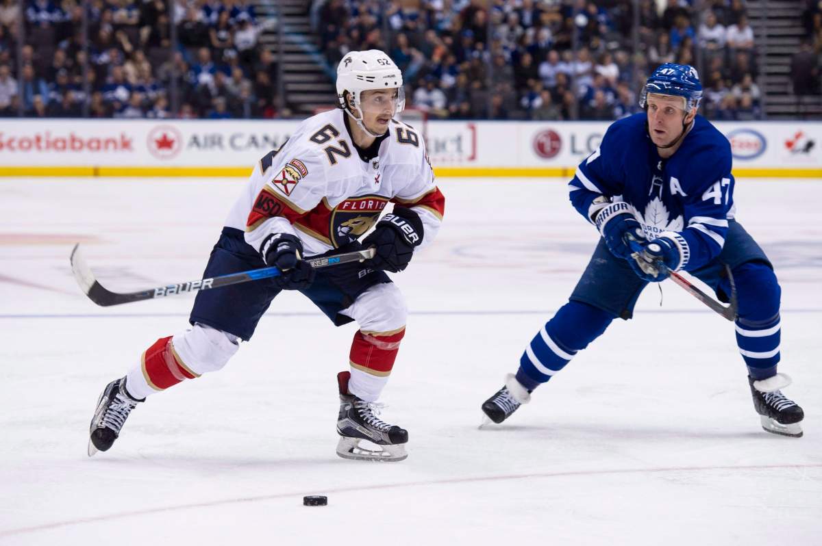 (File photo) Toronto Maple Leafs centre Leo Komarov (47) defends against Florida Panthers centre Denis Malgin (62) during third period NHL action, in Toronto, on Tuesday, February 20, 2018. 