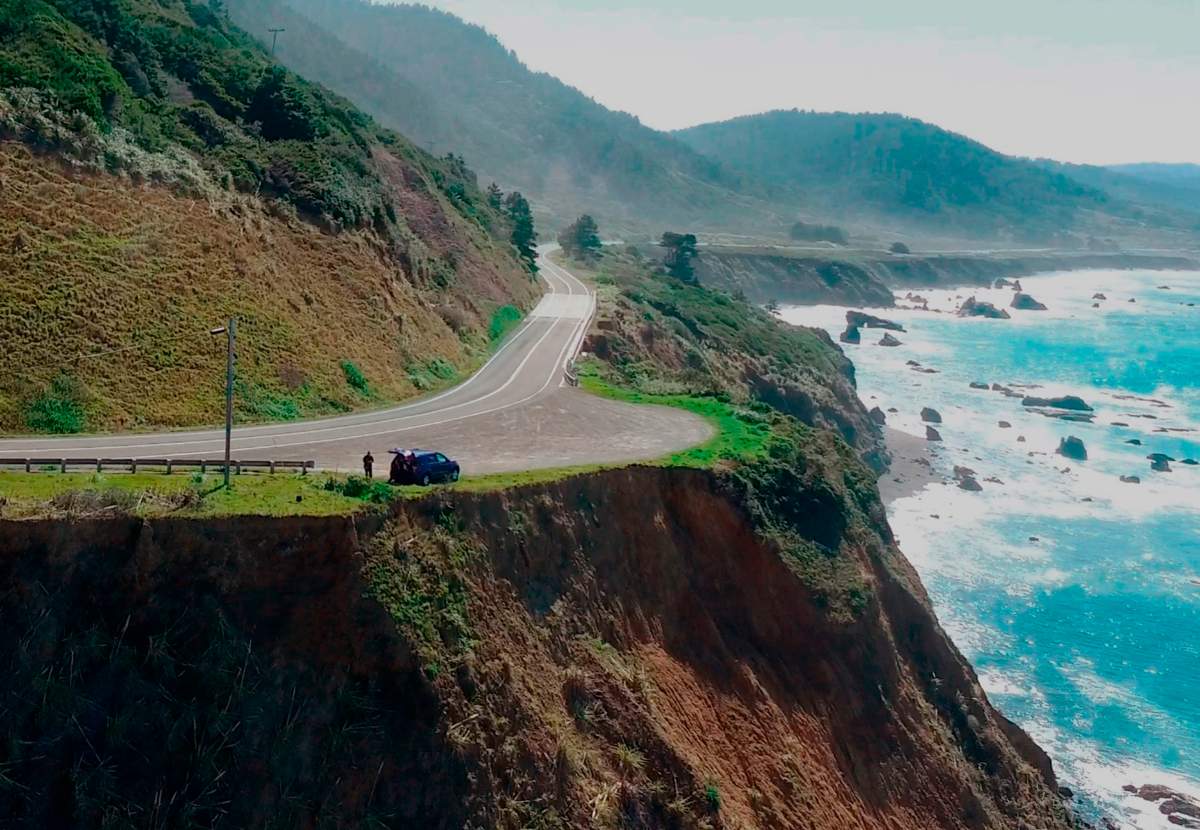 In this March 28, 2018 aerial file image from Alameda County Sheriff’s Office drone video courtesy of Mendocino County shows the pullout where the SUV of Jennifer and Sarah Hart was recovered off the off Pacific Coast Highway 1, near Westport, Calif.