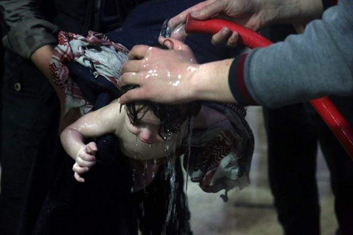 Child treated at a hospital in Ghouta after what a Syria medical relief group claims was a chemical attack.