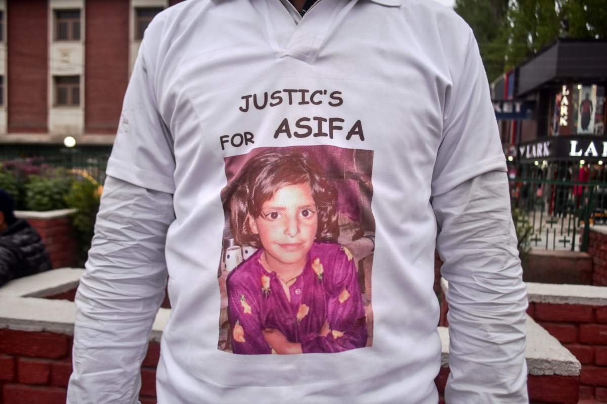 A demonstrator wearing a T- shirt depicting the picture of Asifa Bano during a protest in Srinagar, Indian administered Kashmir. April 16, 2018.
