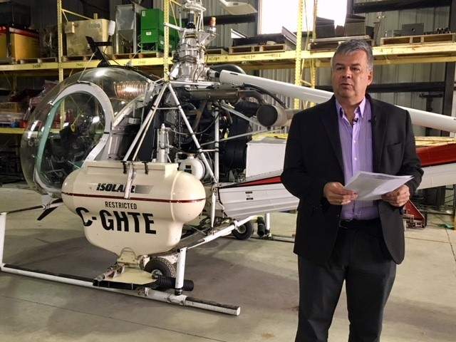 City of Winnipeg superintendent of insect control Ken Nawolsky, in front of one of four larviciding helicoptors.