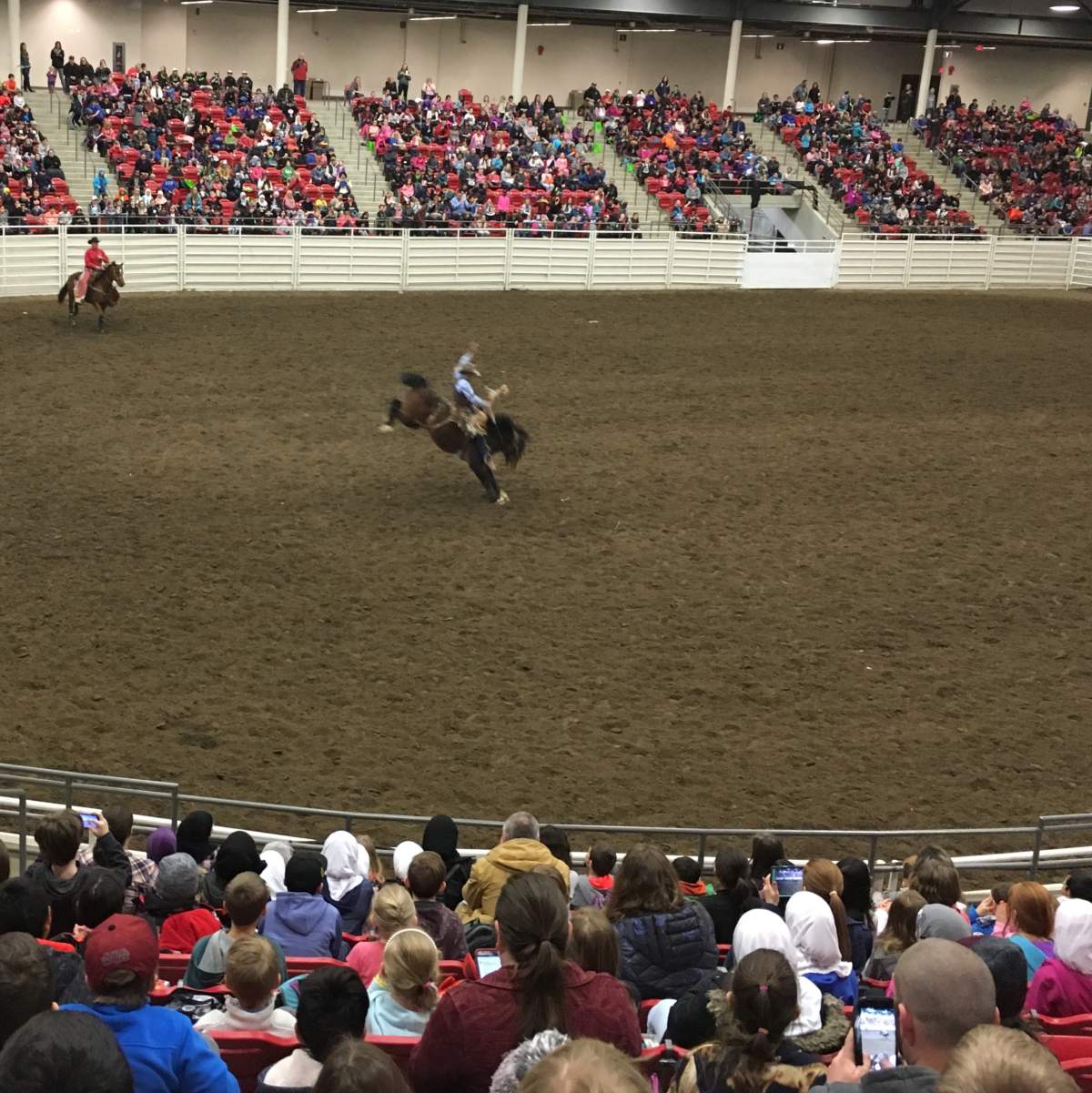 Clay Elliott performs in Saddle Bronc at Aggie Days at Stampede Park in Calgary on April 10, 2018.