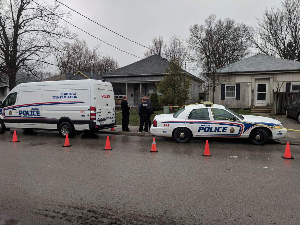London police stationed in front of a residence on Grey Street, the site of a fatal stabbing Tuesday night.