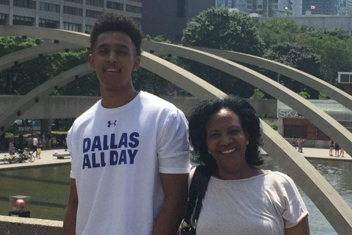 Amaresh Tesfamariam with her nephew at Nathan Phillips Square.