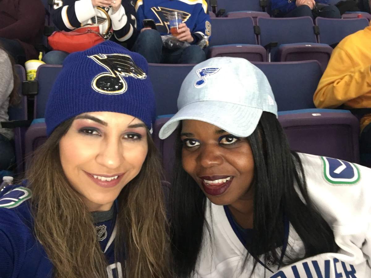 Vanessa Guadiana and her friend in St Louis, the final stop in 7 year journey to attend an NHL home game for all 31 teams.