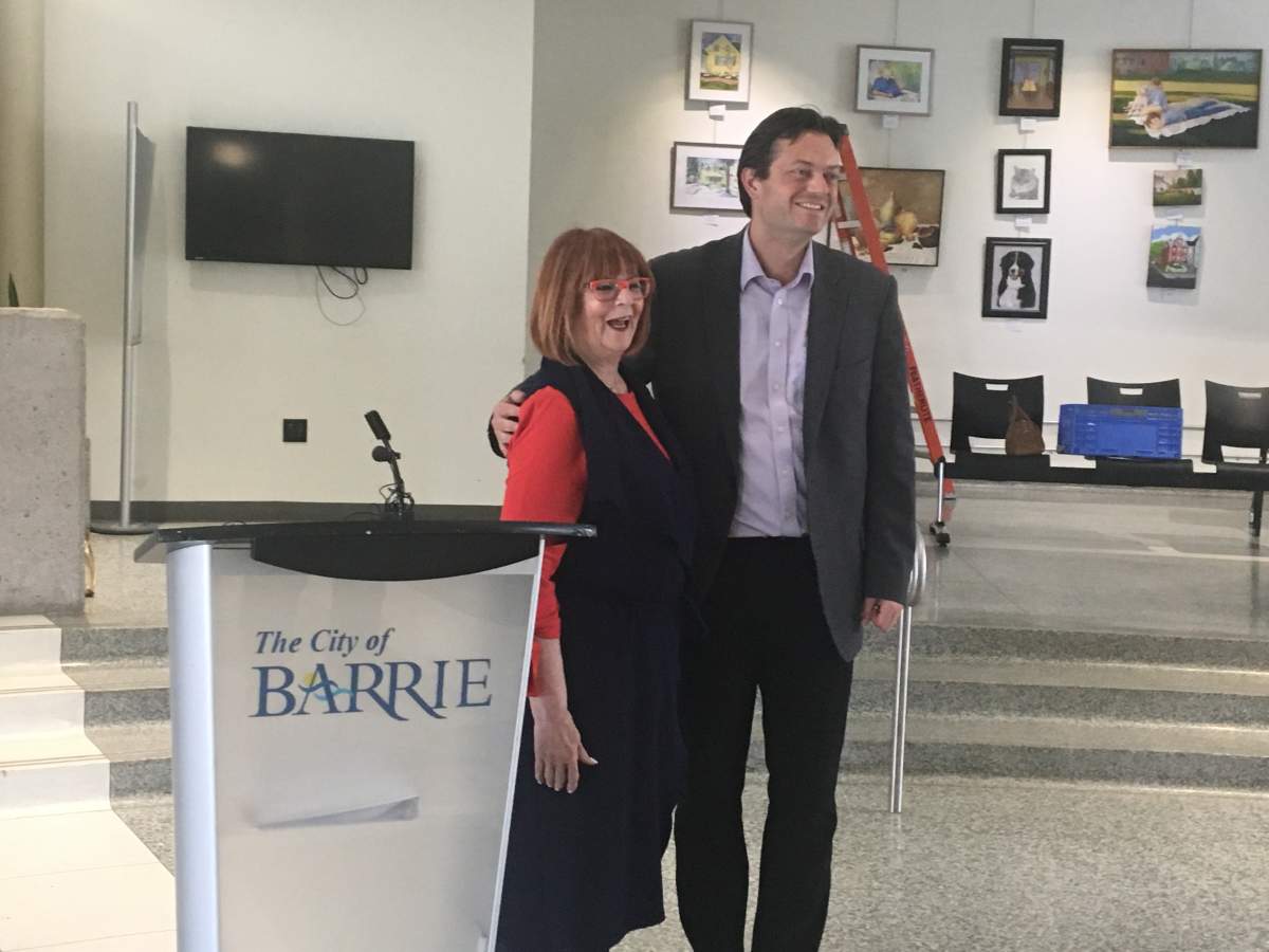 MPP for Barrie Ann Hoggarth (left) and Barrie Mayor Jeff Lehman (right), make housing announcement from Barrie's city hall. 
