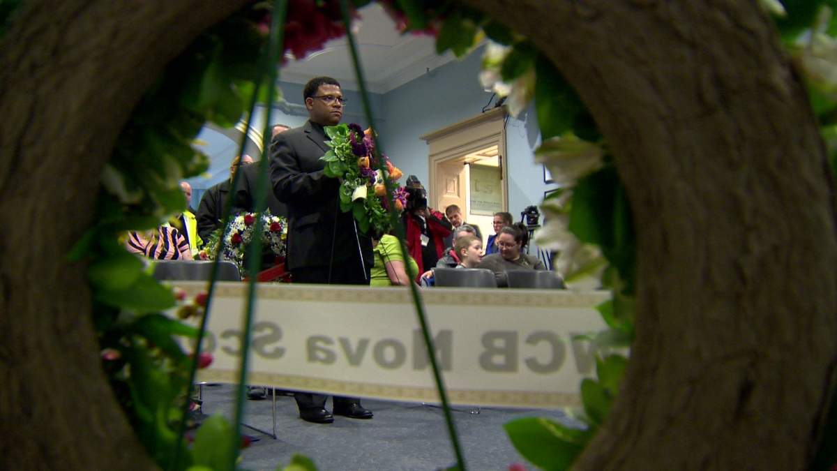 Jason MacLean, president of the Nova Scotia Government & General Employees Union, placed a wreath at Province House in Halifax during an event for the National Day of Mourning on April 28, 2018.