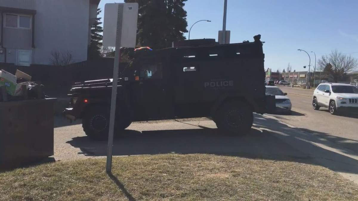 Edmonton police tactical unit seen near 82 Street and 137 Avenue.