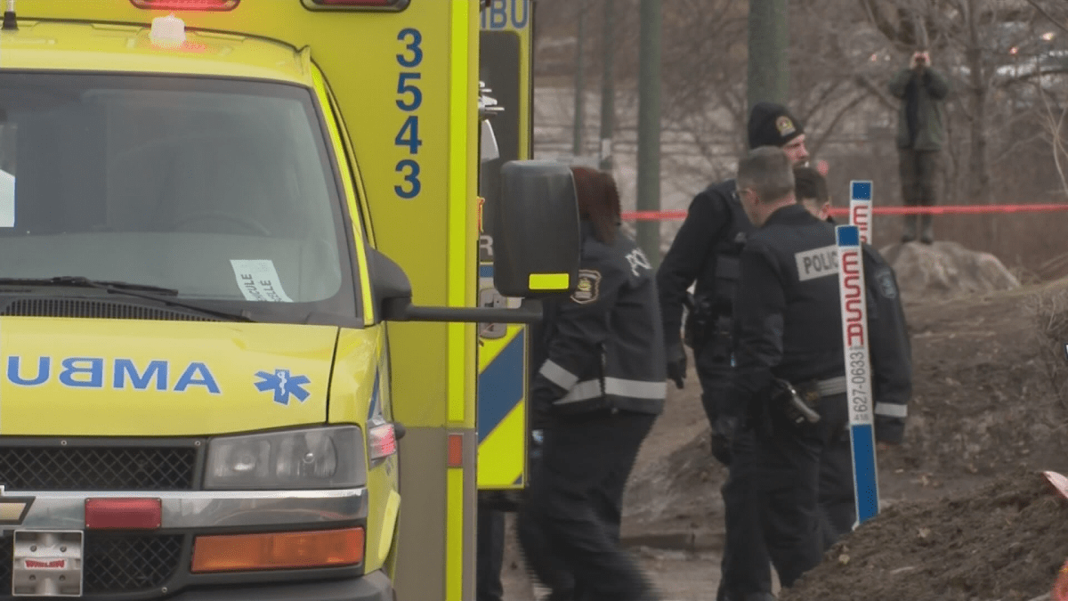 Quebec City paramedics are seen near Parc Bon Air, where an empty stroller was discovered on Wednesday, April 18, 2018.