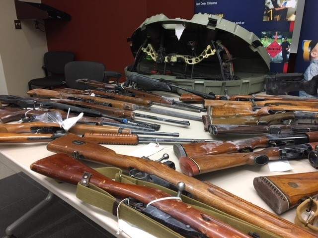 Twenty-nine firearms were among the items seized during two search warrants conducted in Red Deer, Alta. on Monday, Dec. 11, 2017.