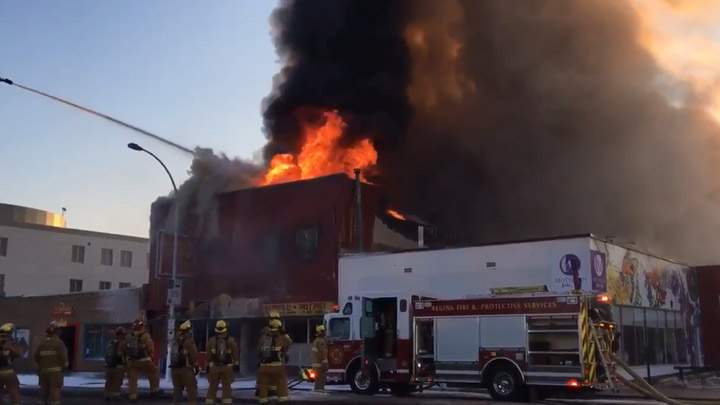 Firefighters battle a major blaze at Lang’s Cafe on Broad Street in downtown Regina.