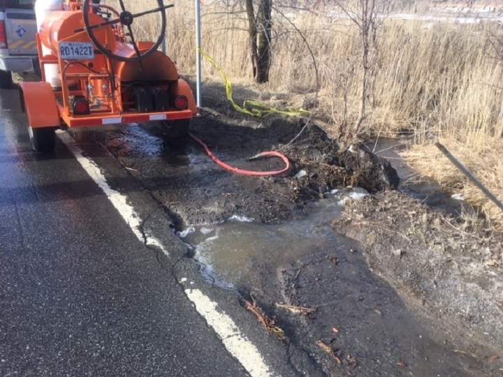 Part of de la Baie Road in Rigaud is closed due to a road collapse following heavy rain.