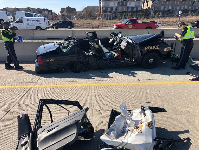 OPP say an officer was seriously injured after his cruiser was struck on Highway 407 on Monday.
