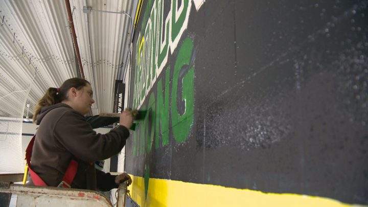 Painters with Student Works Painting created a Humboldt Broncos Strong mural at Schroh Arena.