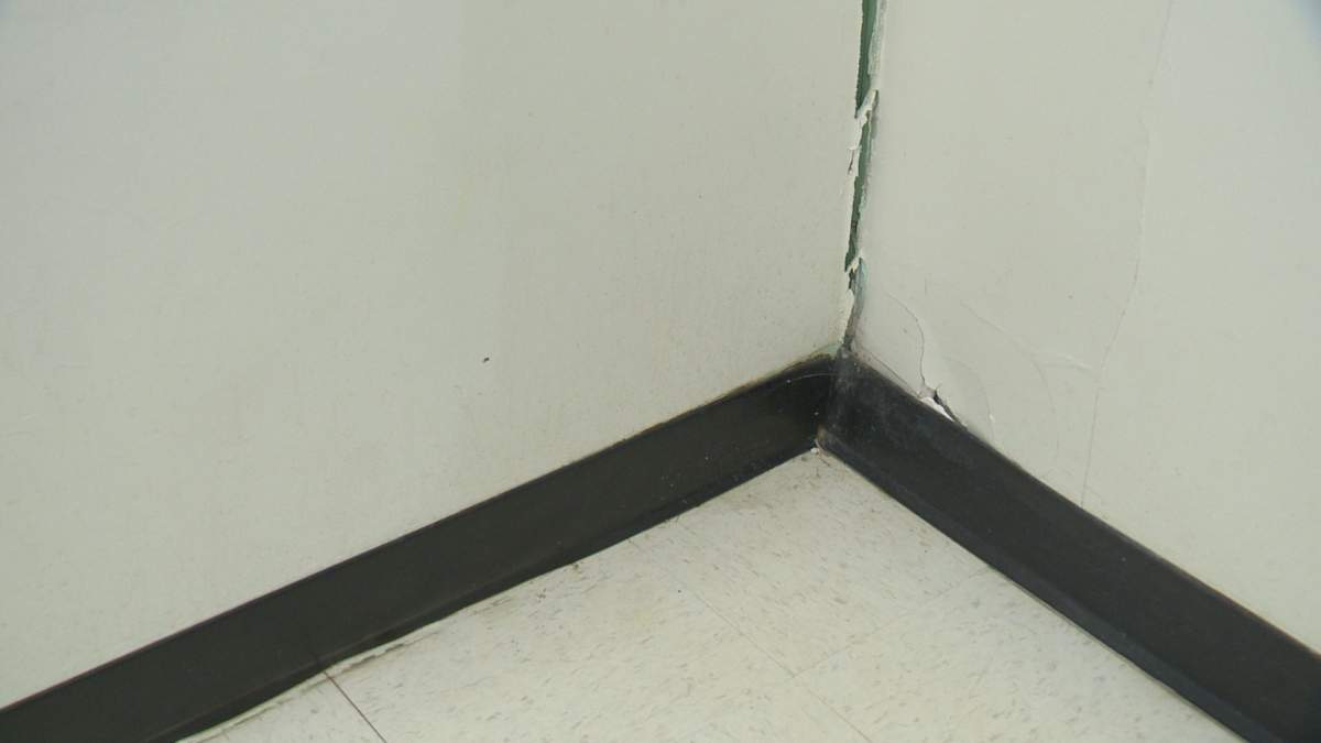 A split between two walls in one of the three closed classrooms at Ecole St. Pius.