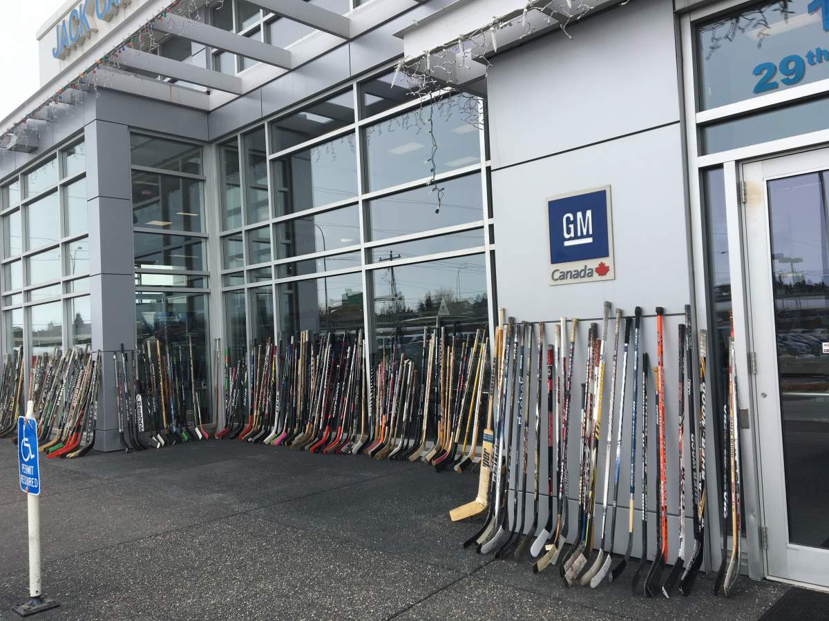 Hockey sticks lined up outside Jack Carter dealership