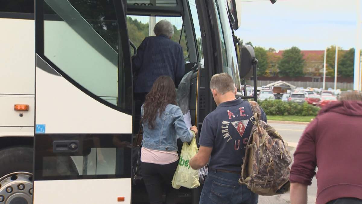 Riders board Maritime bus in 2018.