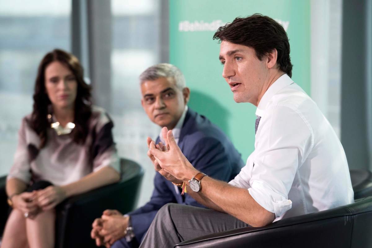 Mayor of London Sadiq Khan, center, meets with Canada’s Prime Minister Justin Trudeau and New Zealand’s Prime Minister Jacinda Ardern, left, at City Hall in London, Wednesday April 18, 2018, during the Commonwealth Heads of Government Meeting.