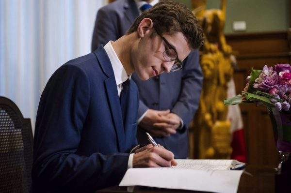 This Nov. 30, 2016 file photo shows Sam Oosterhoff being sworn in as the youngest-ever member of the Ontario legislature.