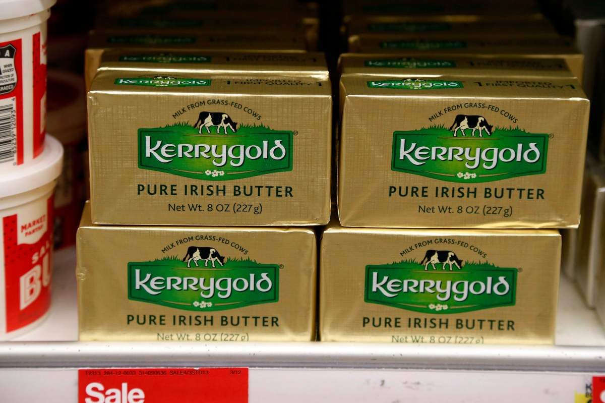 A supply of Kerrygold Pure Irish Butter sits amid other butter brands on a store shelf Friday, March 17, 2017 in Edina, Minn.
