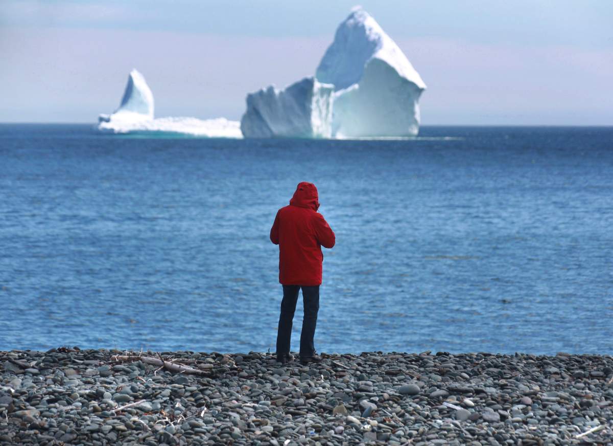 An iceberg is visible from the shore in Ferryland, an hour south of St. John's, Newfoundland on Monday, April 10, 2017.