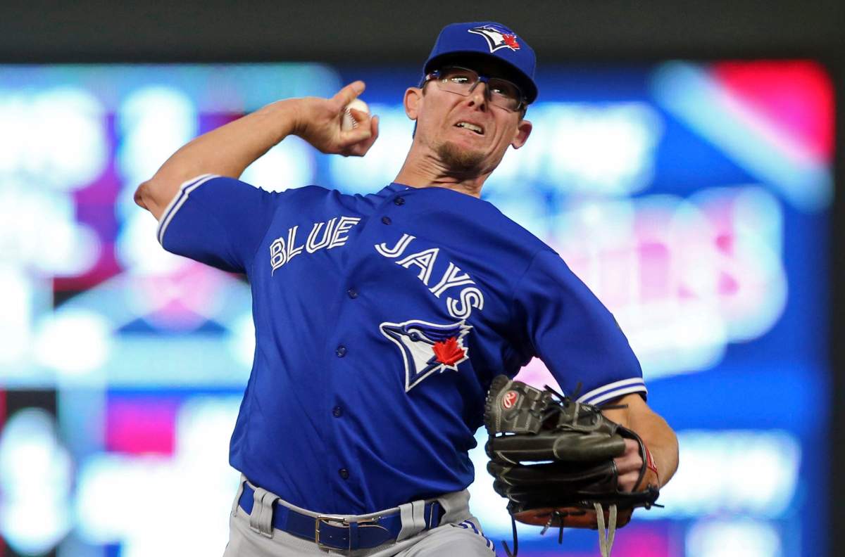 Toronto Blue Jays pitcher Tyler Clippard throws to a Minnesota Twins batter during the ninth inning of a baseball game Tuesday, May 1, 2018, in Minneapolis. The Blue Jays won 7-4 in 10 innings, with Clippard picking up the win.