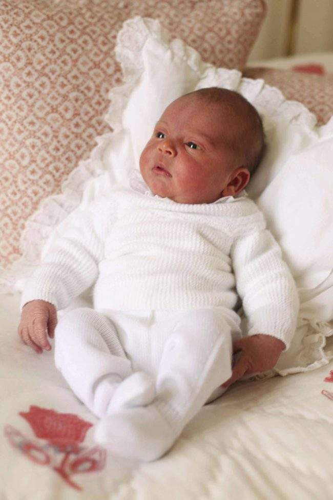 This April 26, 2018 photograph shows Britain’s Prince Louis at Kensington Palace in London.