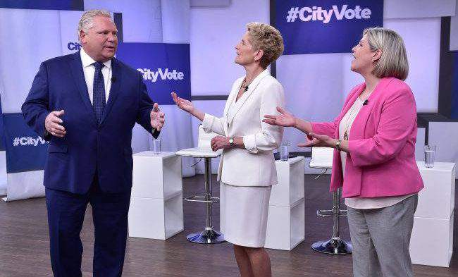 Liberal Premier Kathleen Wynne, Progressive Conservative Leader Doug Ford and NDP Leader Andrea Horwath take part in the Ontario Leaders debate in Toronto, May 7, 2018. 