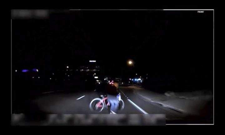 This file image made from video March 18, 2018, of a mounted camera provided by the Tempe Police Department shows an exterior view moments before an Uber SUV hit a woman in Tempe, Ariz.