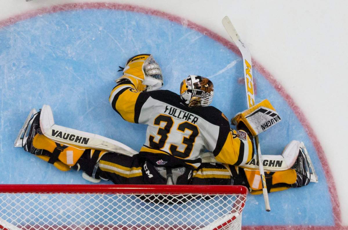 OHL Hamilton Bulldogs goalie Kaden Fulcher (33) fails to stop a shot from Host Regina Pats forward Sam Steel (23) during first period Memorial Cup semifinal action in Regina on Friday, May, 25, 2018.