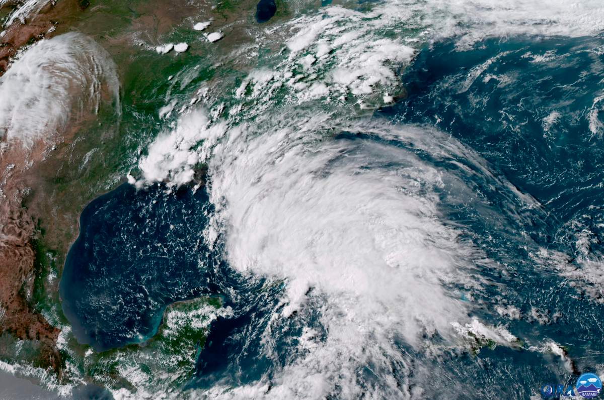 This GOES-16 GeoColor satellite image taken Saturday, May 26, 2018, at 21:30 UTC, and provided by the National Oceanic and Atmospheric Administration (NOAA), shows Subtropical Storm Alberto in the Gulf of Mexico.