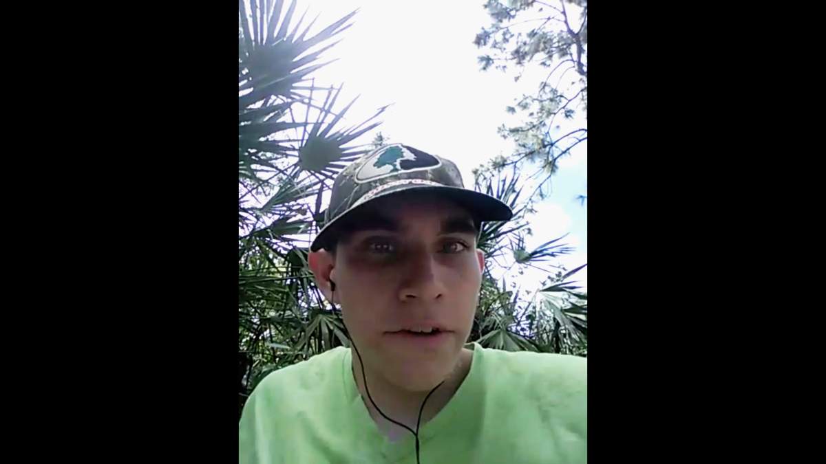 In this image made from one of three videos released Wednesday, May 30, 2018, by the Broward County State Attorney's Office, Nikolas Cruz, the suspect in February's shooting at a Florida high school, announces his intention to become the next school shooter, aiming to kill at least 20 people. 