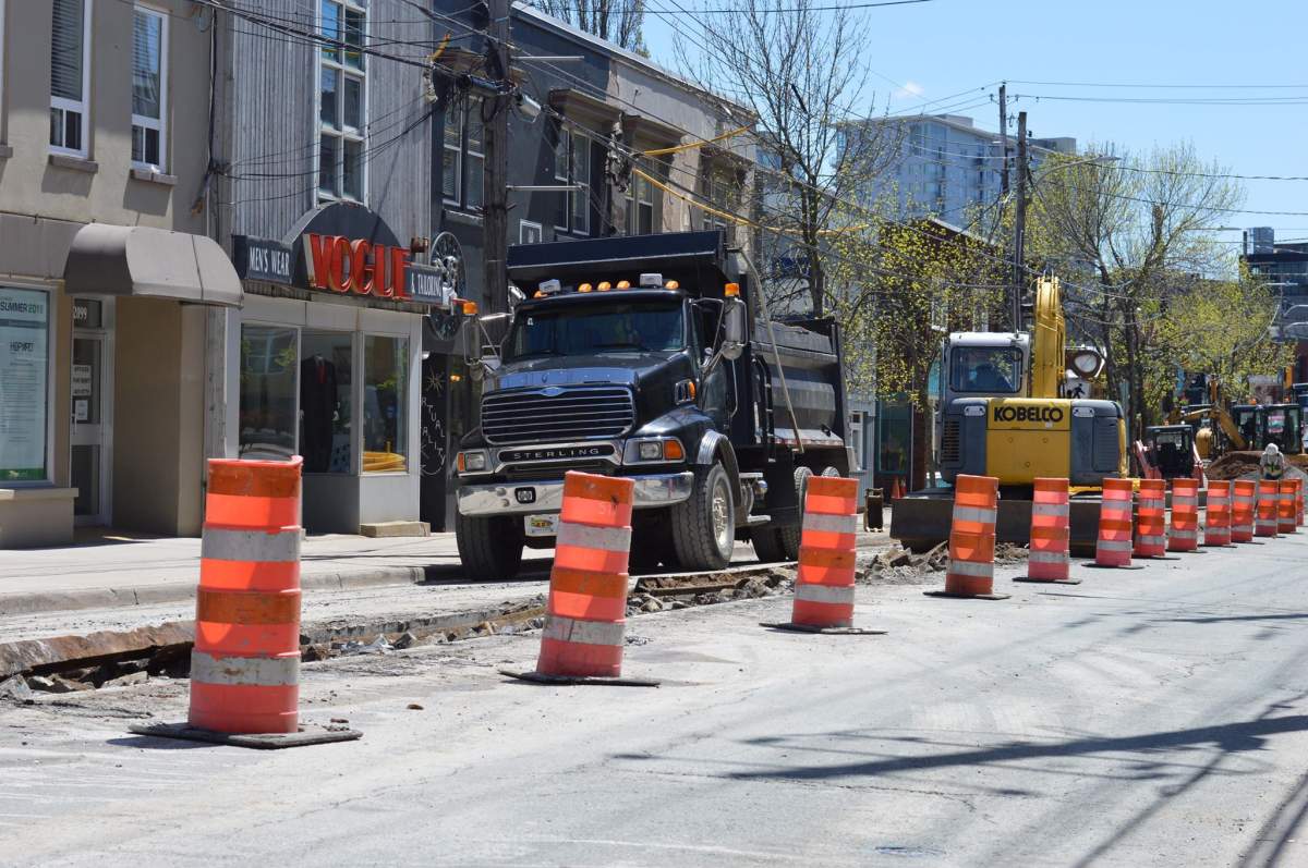 Halifax worker moves some of the old rail tracks for its long-defunct system on Gottingen Street.