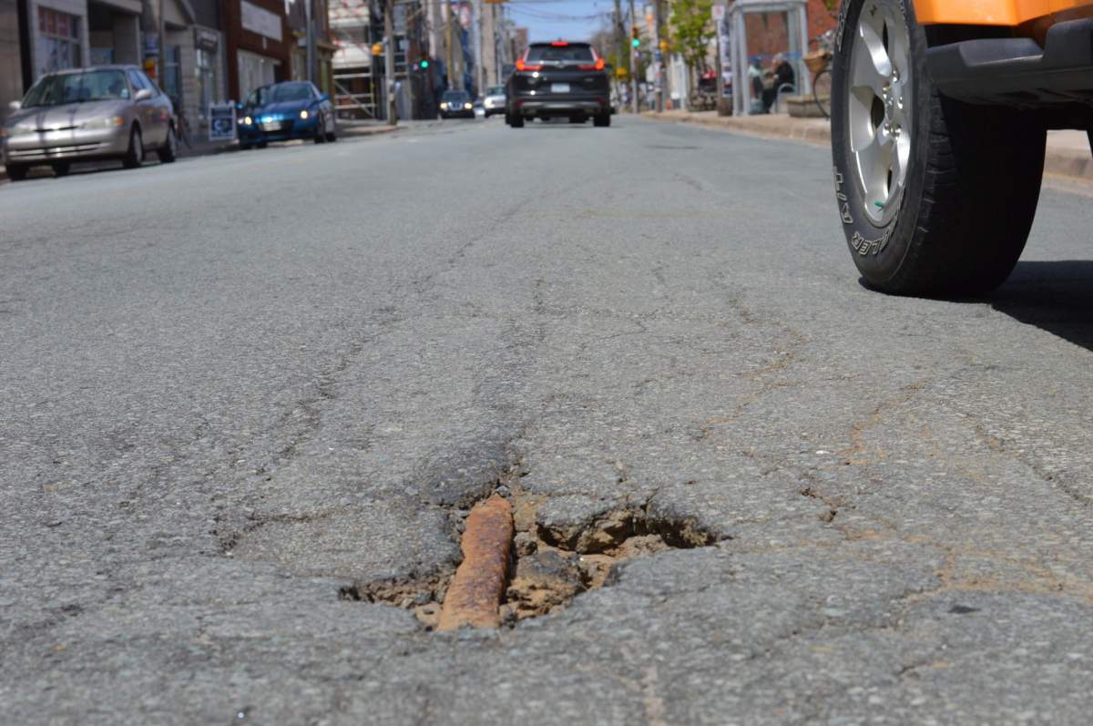 A small piece of metal track appears on Gottingen Street, one of the few remaining pieces of the city's old rail transit system. 