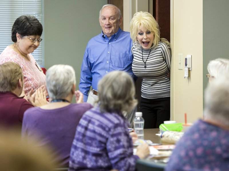 Dolly Parton speaks at renamed My People Senior Activity Center on May 7, 2018.(Brianna Paciorka/Knoxville News Sentinel via AP)