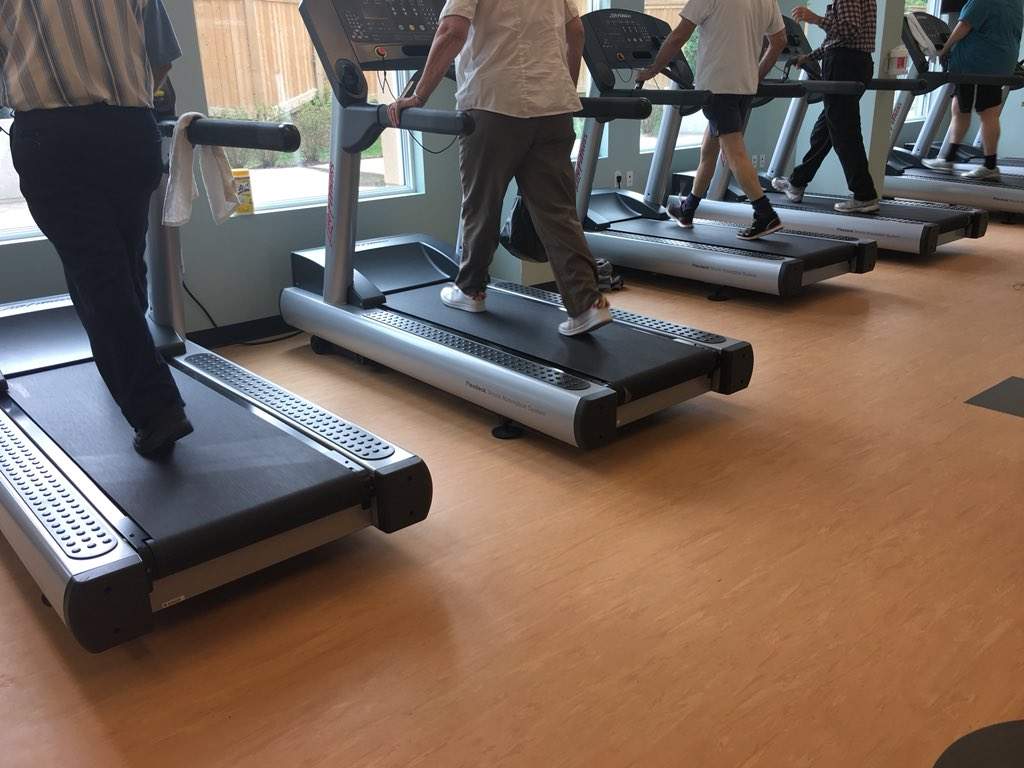 CFI patients warm up for their 12 o'clock exercise class at Advanced Medical Group's ground floor exercise room. 