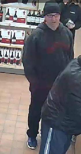 Barrie police are looking to identify a man (above) in connection with a vehicle theft.