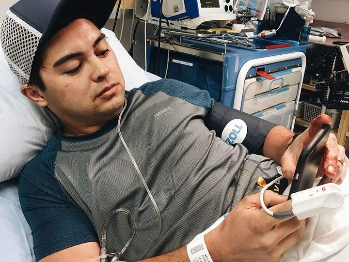 Craig Neilson in the ambulance after being attacked by a bison on Elk Island National Park.