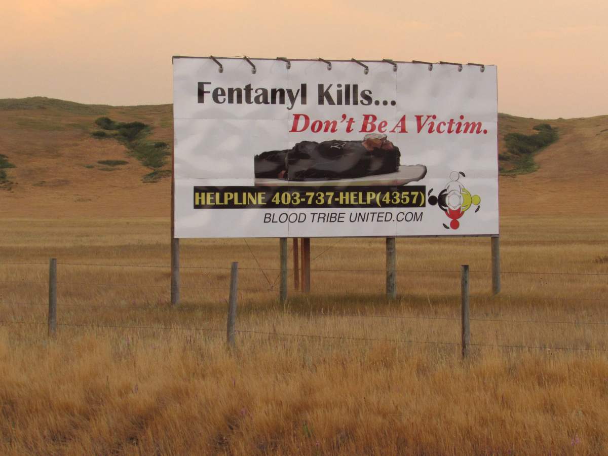 A billboard at the east end of the Blood Reserve in southern Alberta, shown on April 27, 2018, warns about the dangers of fentanyl. Fentanyl addiction has led to several deaths and overdoses.