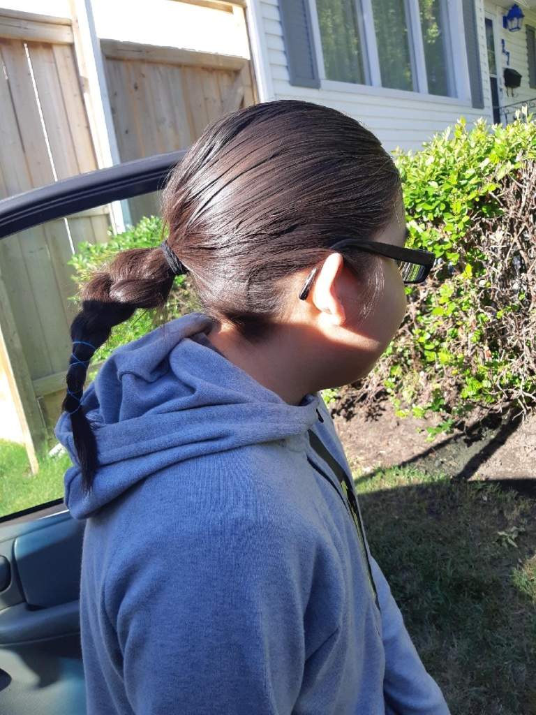 Rafe Vadnais with his braid Monday morning before school