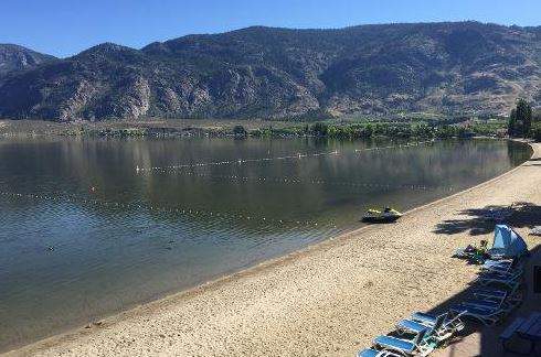 The beach at the Coast Osoyoos Beach Hotel when Osoyoos Lake is at normal levels.