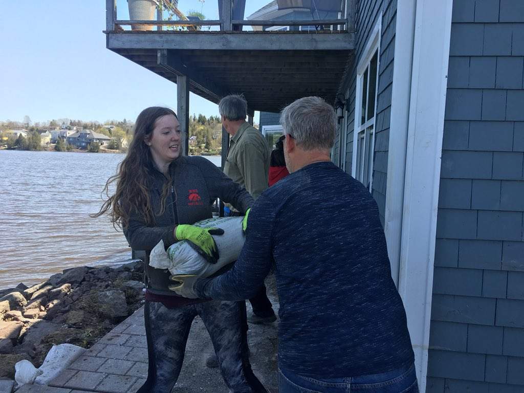 Volunteers were helping to remove sandbags in Millidgeville in Saint John over the weekend. 