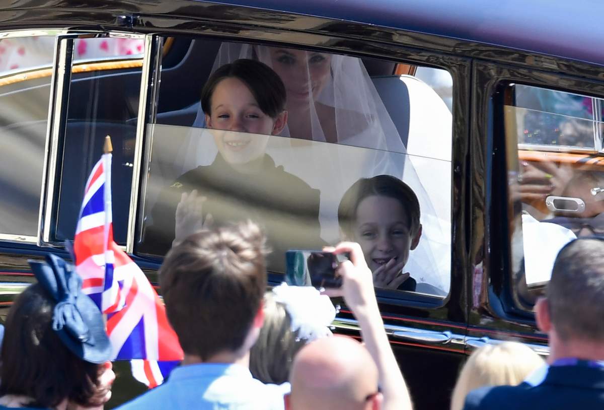 Meghan Markle is driven to St George’s Chapel in Windsor Castle along with her page boys Brian and John Mulroney at St George’s Chapel at Windsor Castle before the wedding of Prince Harry to Meghan Markle on May 19, 2018 in Windsor, England. (Photo by Toby Melville- WPA Pool/Getty Images )